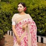 The attire shown in the image is a Half Silk Screen Print Floral Saree (শাড়ি), a highly popular and trendy traditional outfit.